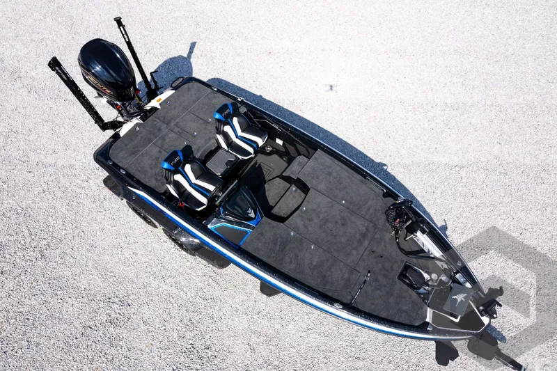 Slide: The Image of 2027 Skeeter FXE20 Pro fishing boat, aerial view, sleek design, dual seats, powerful motor. - 36