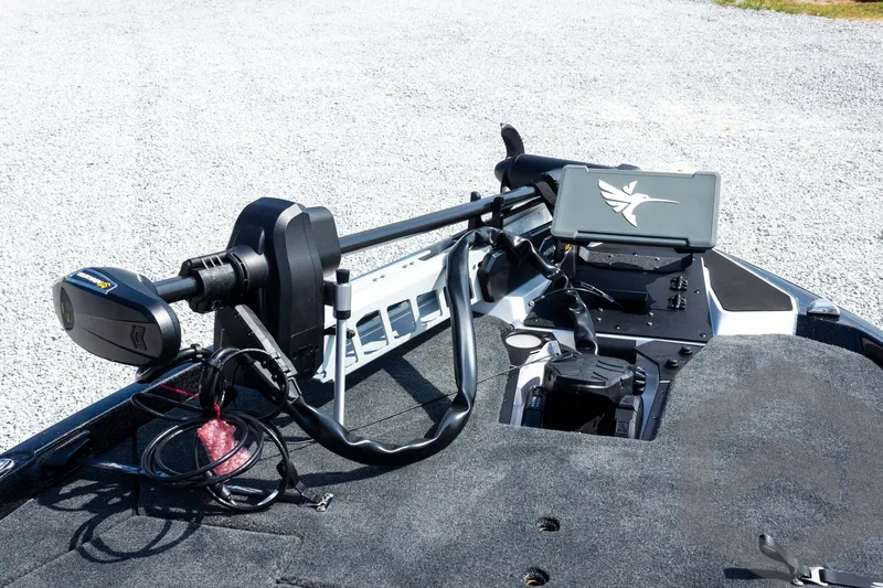 Slide: The Image of 2027 Skeeter FXE20 Pro boat deck with advanced trolling motor and control panel. - 16