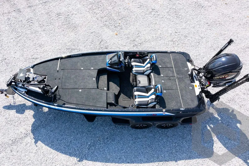 Slide: The Image of 2027 Skeeter FXE20 Pro fishing boat, aerial view, dual seats, trolling motor, gravel background. - 31