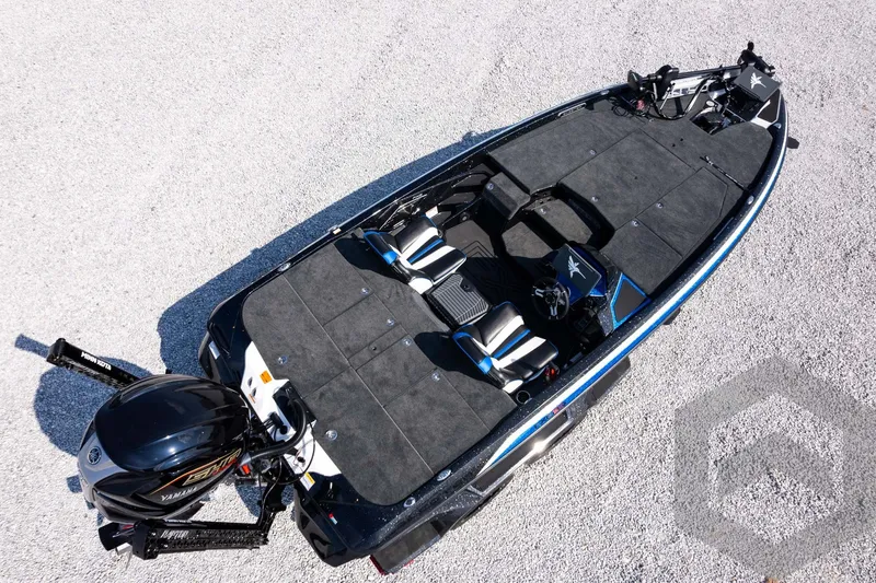 Slide: The Image of 2027 Skeeter FXE20 Pro fishing boat, aerial view, featuring spacious deck and Yamaha motor. - 34