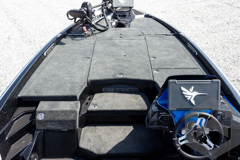Slide: The Image of 2027 Skeeter FXE20 Pro boat interior with advanced steering and navigation systems. - 14