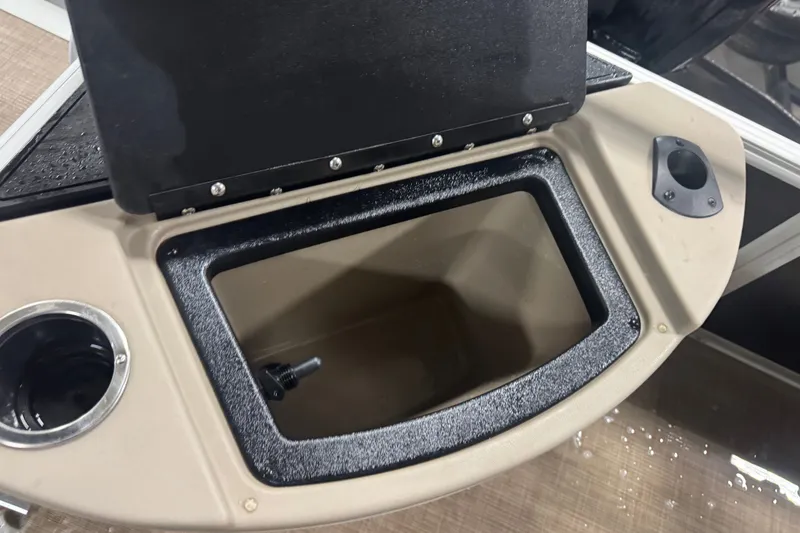 Slide: The Image of 2021 Sun Tracker Fishin' Barge 20 DLX livewell with cup holder and rod holder. - 19