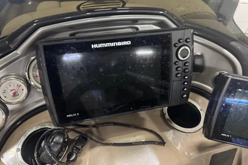 Slide: The Image of Humminbird Helix 9 fish finder on 2021 Sun Tracker Fishin' Barge 20 DLX dashboard. - 14
