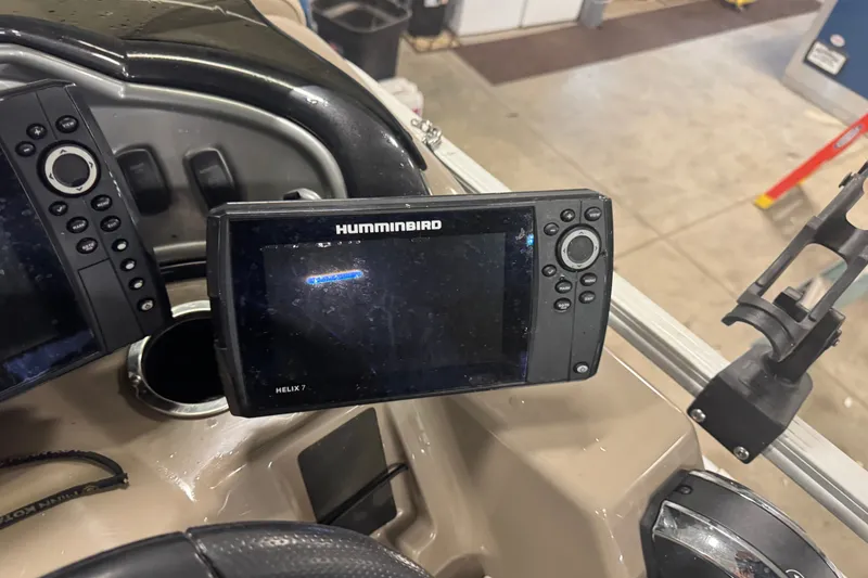 Slide: The Image of Humminbird Helix 7 fish finder on 2021 Sun Tracker Fishin' Barge 20 DLX dashboard. - 15