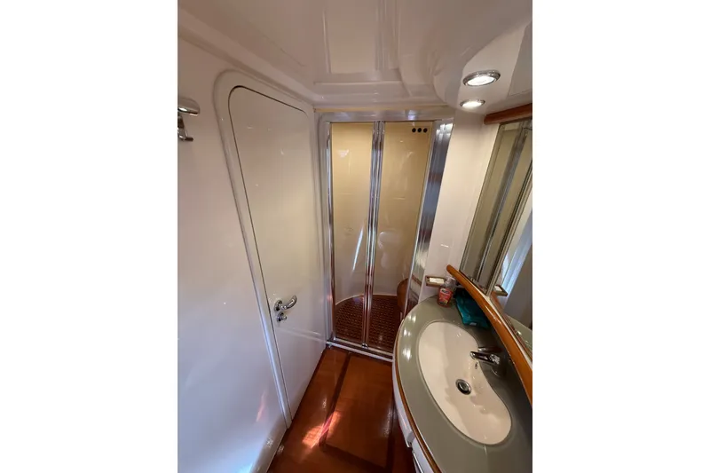 Slide: The Image of Bathroom interior of 2008 Azimut 62E yacht with shower and sink. - 39