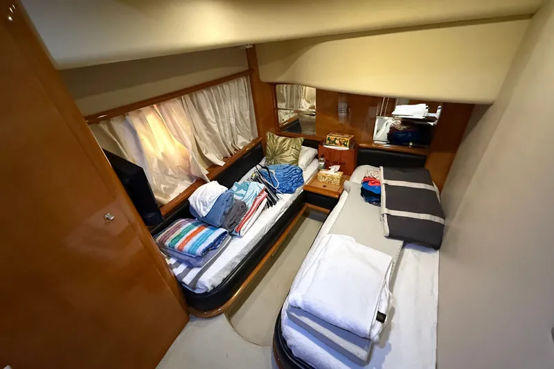 Slide: The Image of Interior cabin of 2008 Azimut 62E yacht with twin beds and cozy decor. - 46