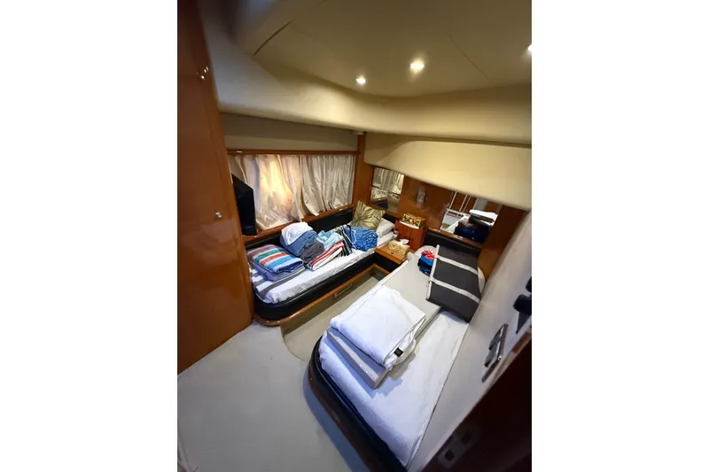 Slide: The Image of Luxurious cabin interior of 2008 Azimut 62E yacht with twin beds and elegant decor. - 47