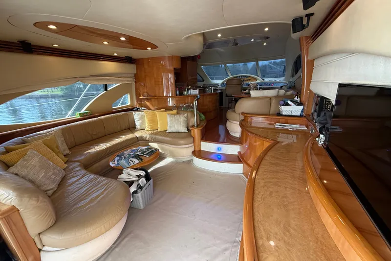Slide: The Image of Luxurious interior of a 2008 Azimut 62E yacht with elegant seating and modern amenities. - 21