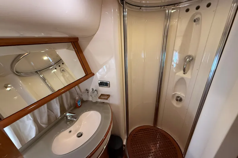 Slide: The Image of Luxurious bathroom in 2008 Azimut 62E yacht with modern shower and sink. - 49