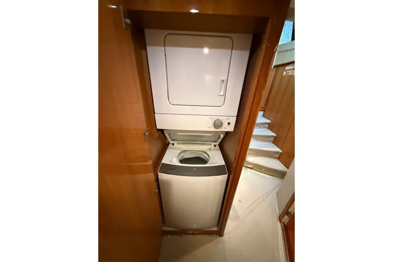 Slide: The Image of Stacked washer and dryer in 2008 Azimut 62E yacht interior. - 48