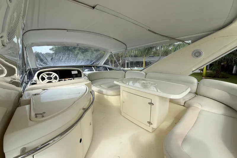 Slide: The Image of Luxurious interior of a 2008 Azimut 62E yacht with elegant seating and helm. - 4