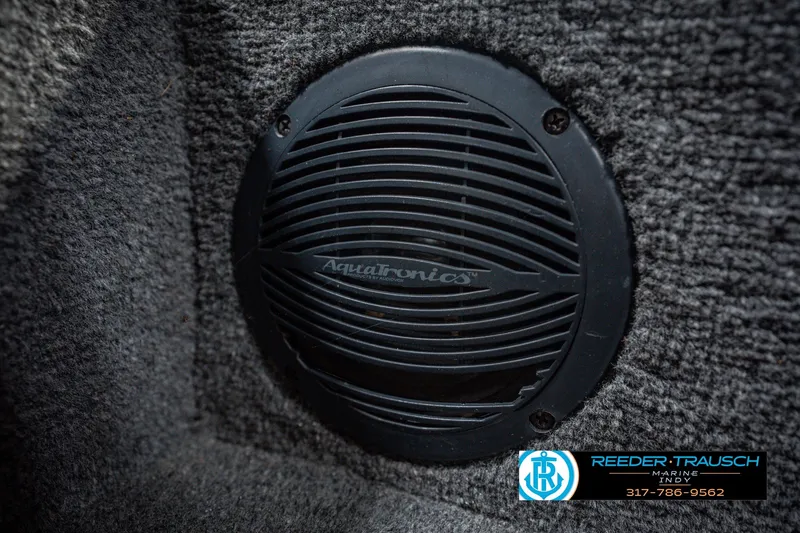 Slide: The Image of Aquatronics speaker in 1999 Lund Mr. Pike 17 boat interior, Reeder-Trausch Marine logo visible. - 44