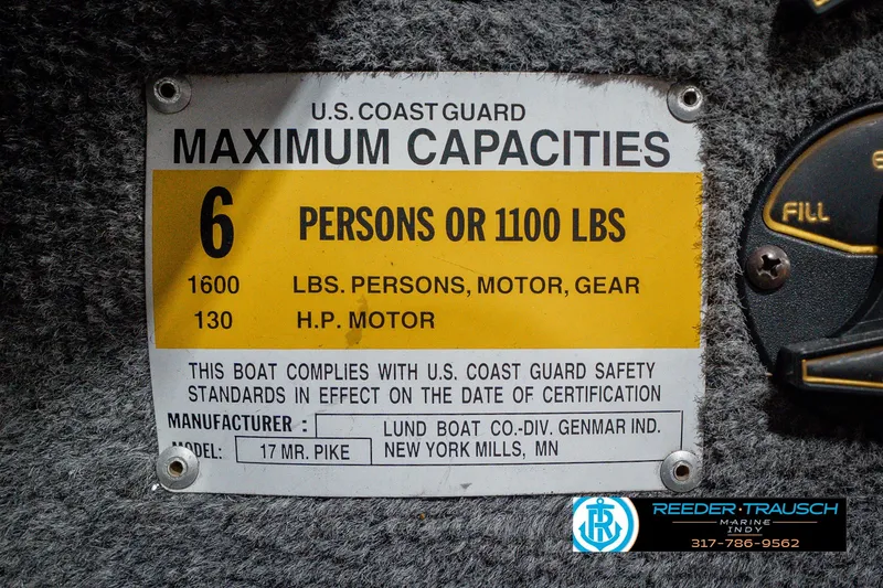 Slide: The Image of 1999 Lund Mr. Pike 17 capacity label: 6 persons or 1100 lbs, 1600 lbs motor, 130 HP. - 62