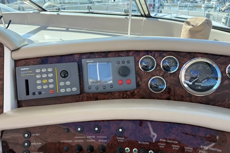 Slide: The Image of Control panel of a 1994 Sea Ray 500 Sundancer yacht with navigation instruments. - 17