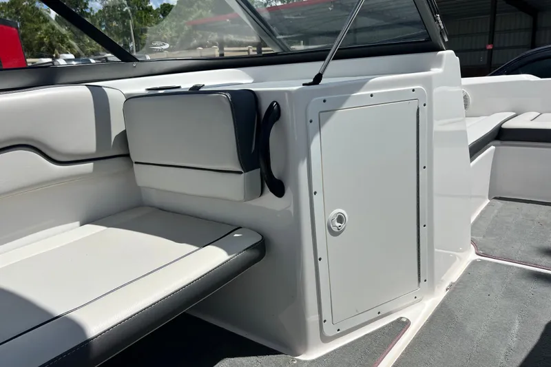 Slide: The Image of Interior of 2022 Yamaha Boats AR190, featuring sleek seating and storage compartment. - 27