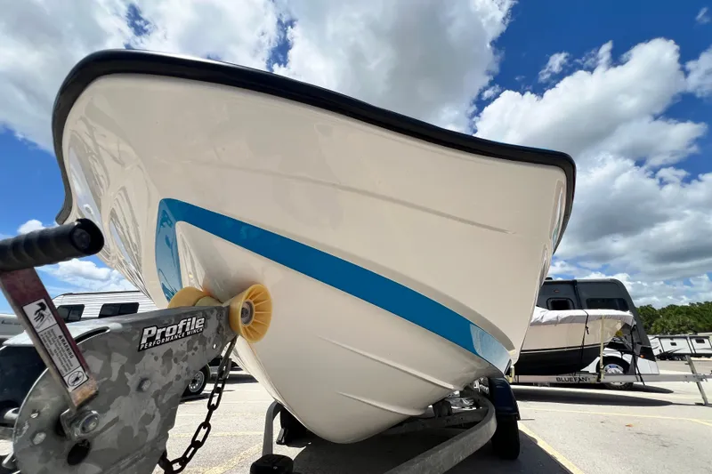 Slide: The Image of 2022 Yamaha Boats AR190 on trailer under blue sky with clouds. - 8