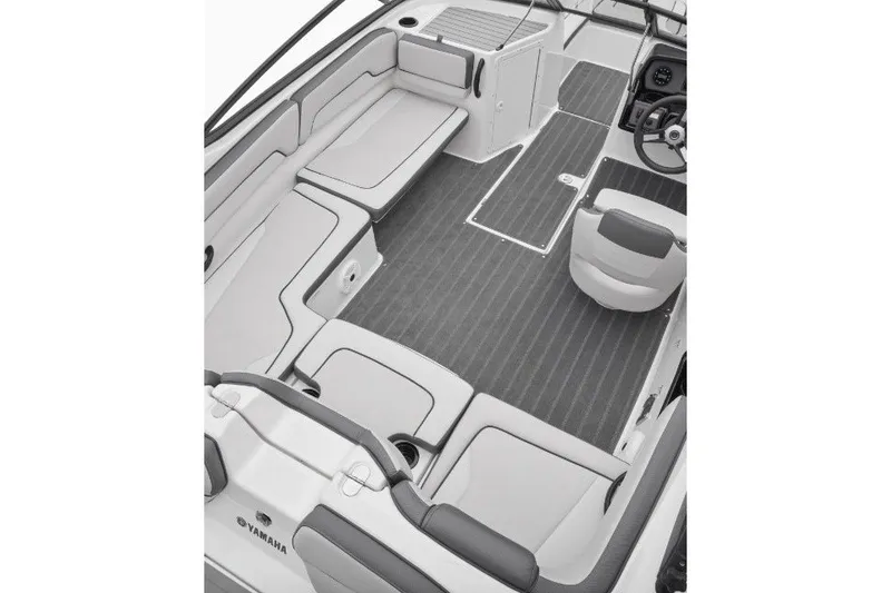 Slide: The Image of 2022 Yamaha Boats AR190 interior with spacious seating and modern design. - 6
