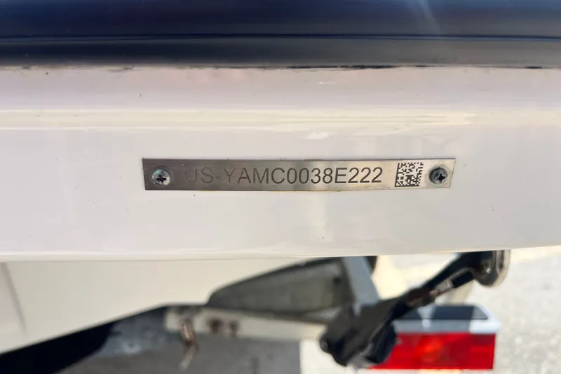Slide: The Image of 2022 Yamaha Boats AR190 hull identification number plate with QR code. - 55