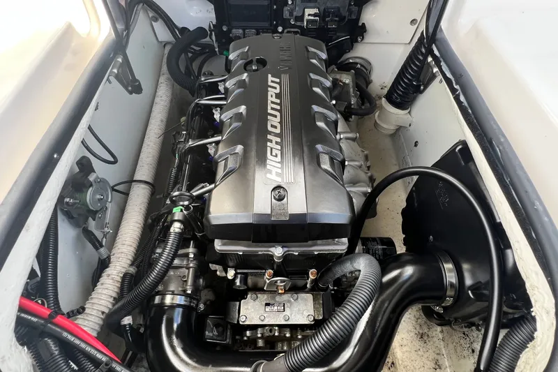 Slide: The Image of 2022 Yamaha Boats AR190 engine compartment showcasing high output engine components. - 57