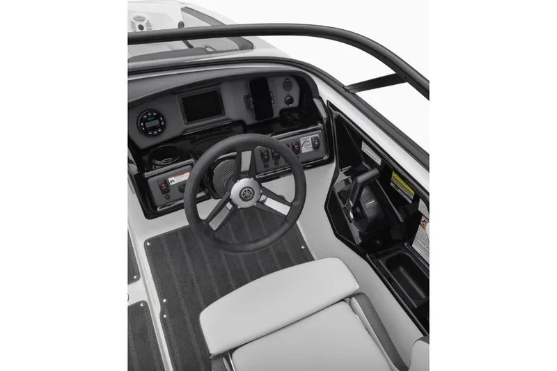 Slide: The Image of 2022 Yamaha Boats AR190 cockpit with steering wheel and control panel. - 5