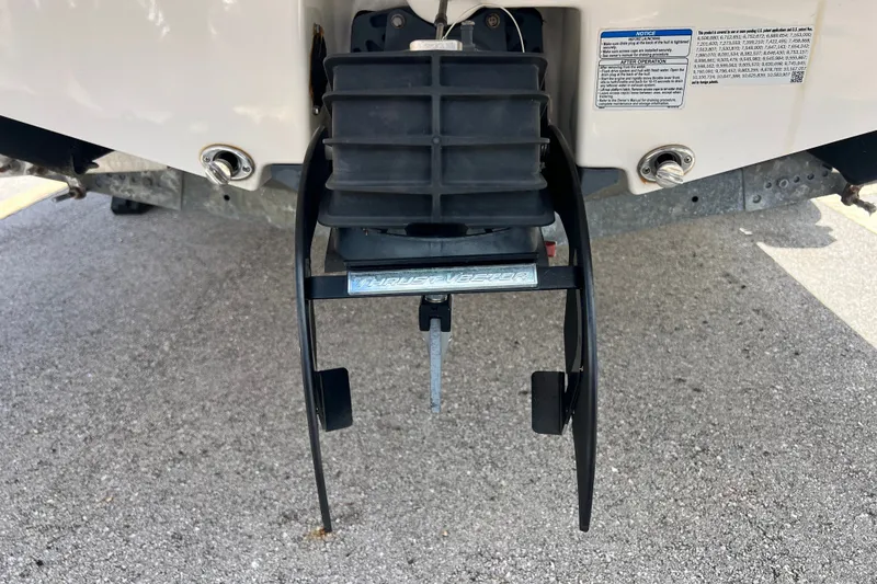 Slide: The Image of Close-up of 2022 Yamaha AR190 boat's thrust vector mechanism on pavement. - 4