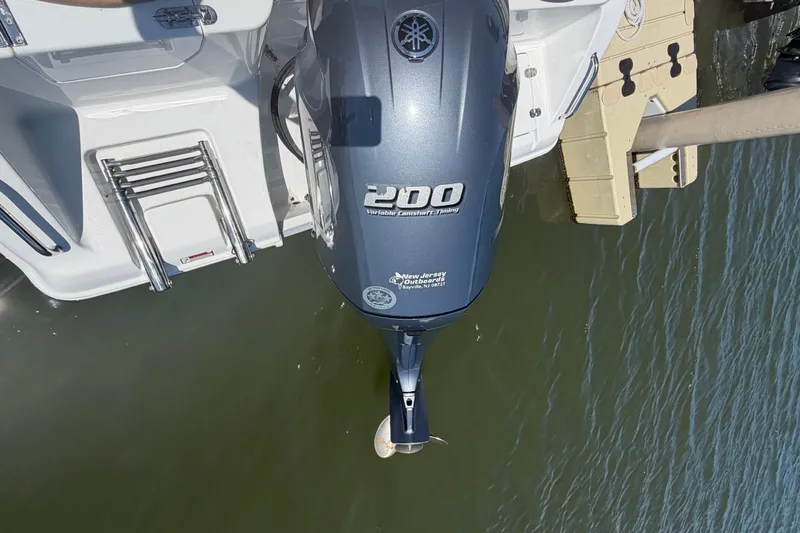 Slide: The Image of Overhead view of a 2023 Sea Hunt Ultra 234 boat with Yamaha 200 outboard motor. - 14