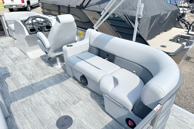 Slide: The Image of 2027 Bentley Pontoons Legacy 200 Navigator interior with plush seating and modern helm. - 8