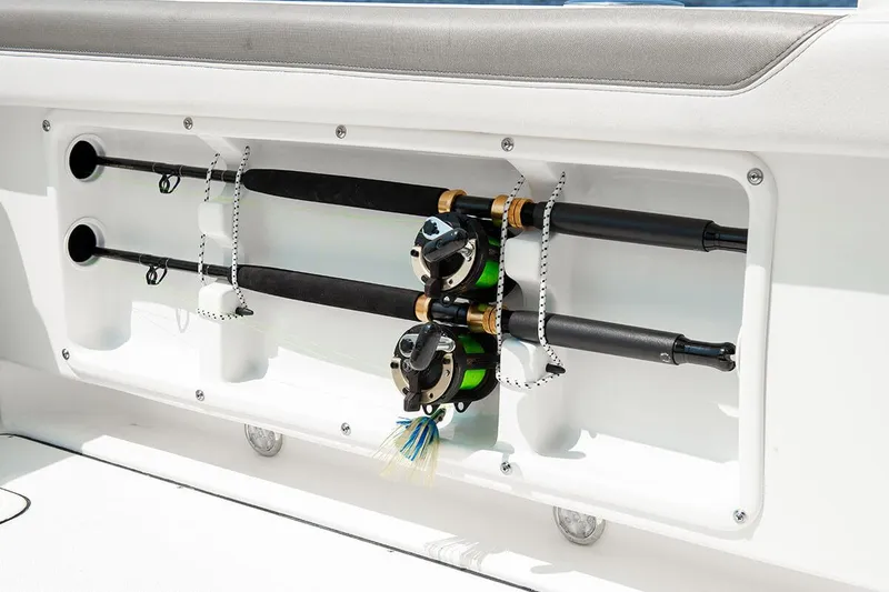 Slide: The Image of Manufacturer Provided Image: Fishing rods stored on a 2026 World Cat 296 DC boat. - 21