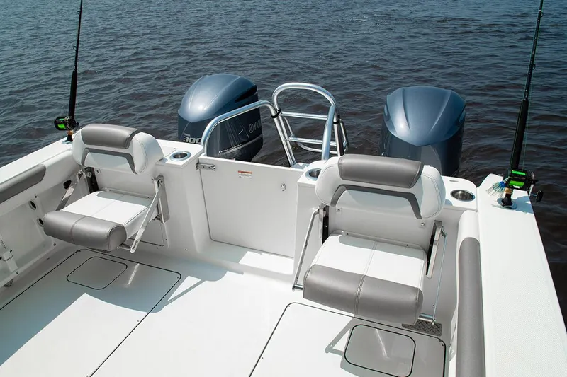 Slide: The Image of Manufacturer Provided Image: 2026 World Cat 296 DC boat with dual engines and comfortable seating on open water. - 18