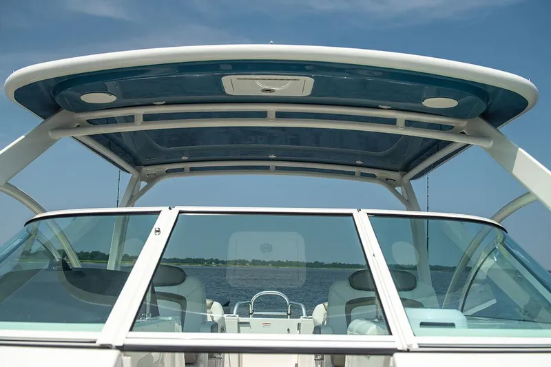 Slide: The Image of Manufacturer Provided Image: 2026 World Cat 296 DC boat with sleek design and spacious seating on open water. - 11