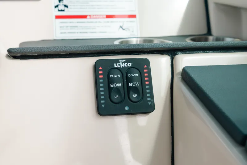 Slide: The Image of Control panel on 2024 Boston Whaler 320 Vantage boat dashboard. - 38