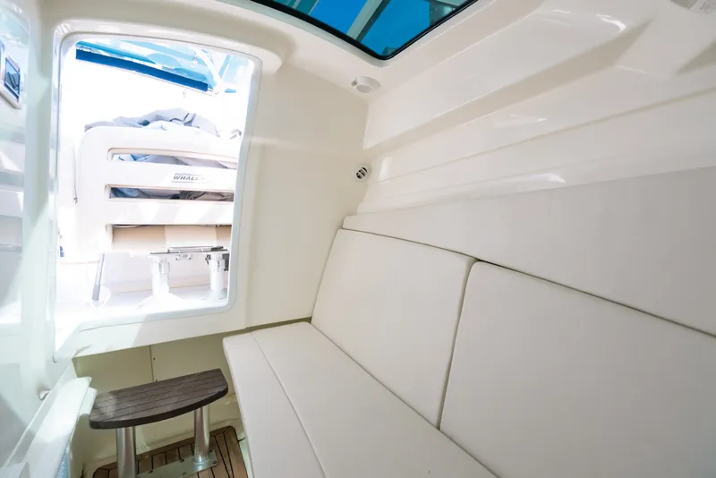 Slide: The Image of Interior view of 2024 Boston Whaler 320 Vantage, featuring sleek seating and modern design. - 58