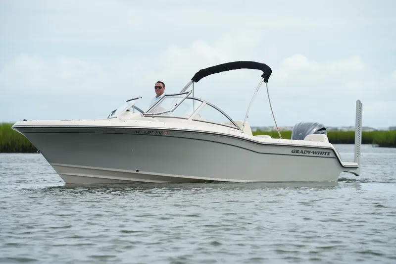 The Image of 2022 Grady-White Freedom 215 boat cruising on calm water. - 0