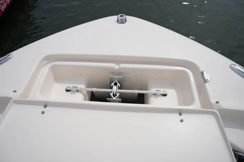 Slide: The Image of Bow anchor compartment of 2022 Grady-White Freedom 215 boat, open and empty. - 29