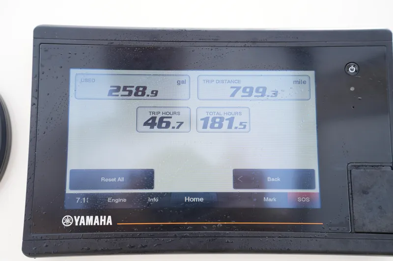 Slide: The Image of Yamaha display showing fuel usage, trip distance, and hours for 2022 Grady-White Freedom 215. - 21