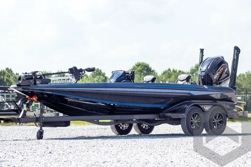 The Image of 2027 Skeeter FXE21 Apex boat on trailer, sleek design, dual motors, outdoor setting. - 1