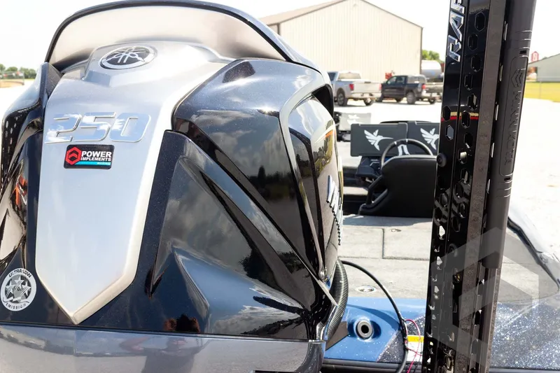Slide: The Image of 2027 Skeeter FXE21 Apex boat engine with 250 horsepower, Power Implements logo visible. - 11