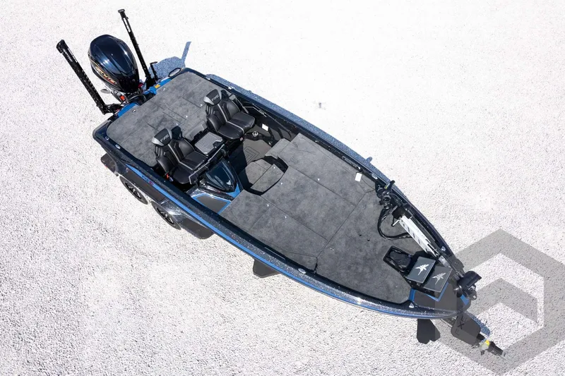 Slide: The Image of 2027 Skeeter FXE21 Apex boat, aerial view, sleek design, dual seats, powerful motor. - 36