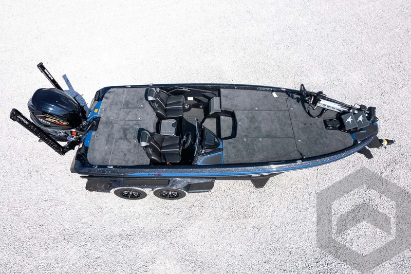Slide: The Image of 2027 Skeeter FXE21 Apex boat, aerial view, showcasing sleek design and spacious interior. - 35