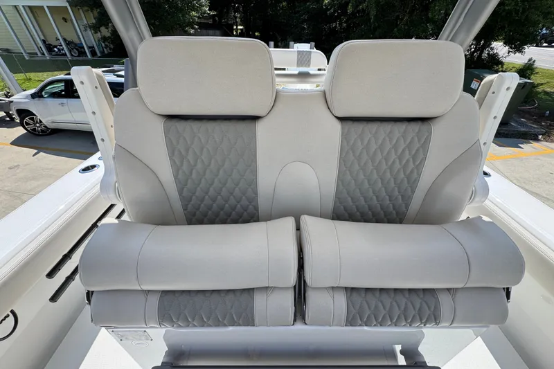 Slide: The Image of Luxury seating on 2027 Solace 32CS boat, featuring quilted upholstery and ergonomic design. - 35