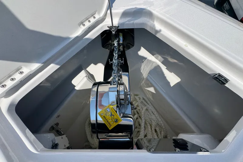 Slide: The Image of Anchor compartment of 2027 Solace 32CS boat with chain and rope. - 25