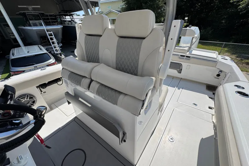 Slide: The Image of Luxury seating on 2027 Solace 32CS boat, featuring premium upholstery and modern design. - 34