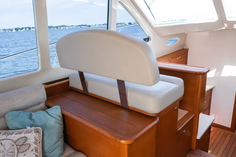 Slide: The Image of Luxurious interior of 2017 Palm Beach Motor Yachts PB42 with elegant seating and wood finish. - 33