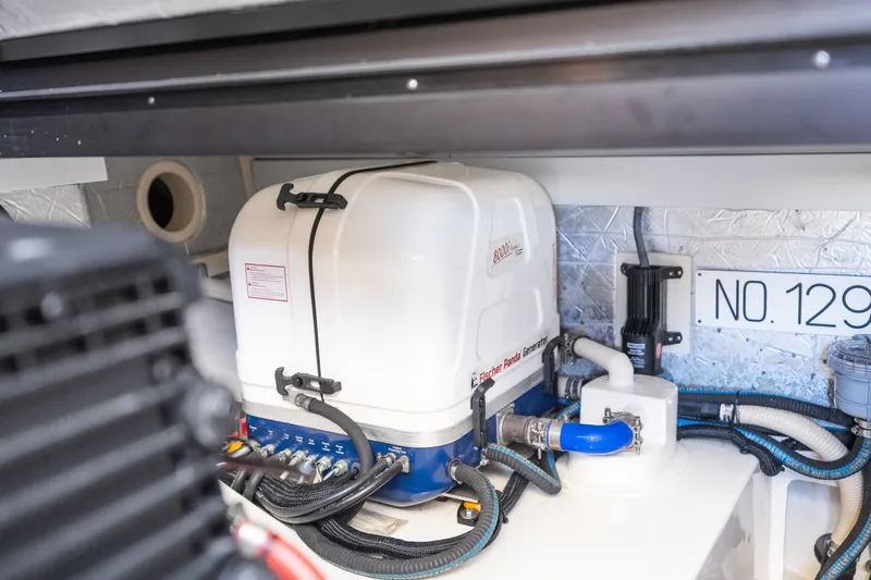 Slide: The Image of Engine room of 2017 Palm Beach Motor Yachts PB42 with Fischer Panda generator. - 56