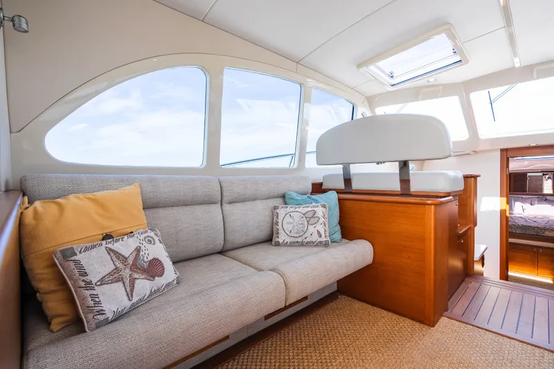 Slide: The Image of Luxurious interior of 2017 Palm Beach Motor Yachts PB42 with cozy seating and nautical decor. - 27