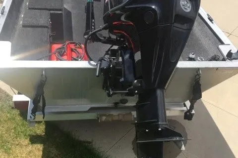 Slide: The Image of 2014 Extreme Boats Brute 1448T with outboard motor, rear view. - 9