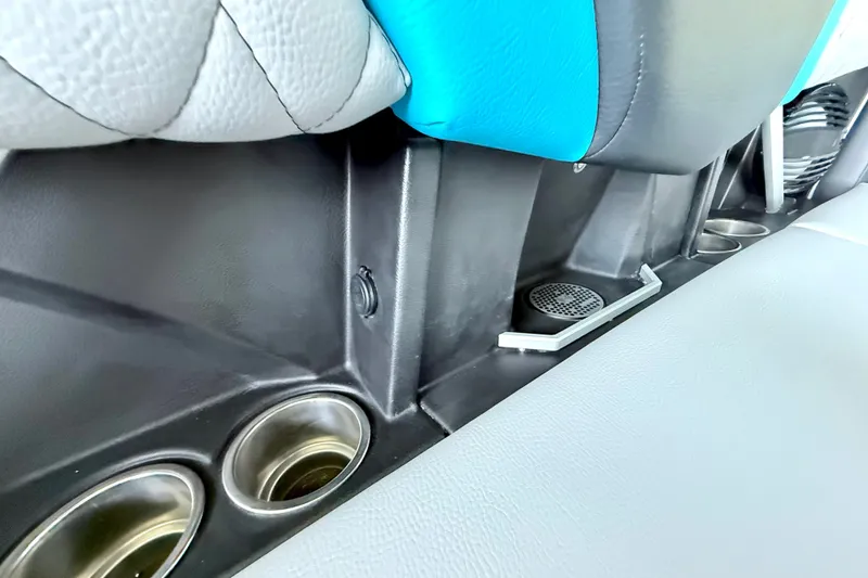 Slide: The Image of 2023 Tige Z3 interior detail with cup holders and speaker. - 33