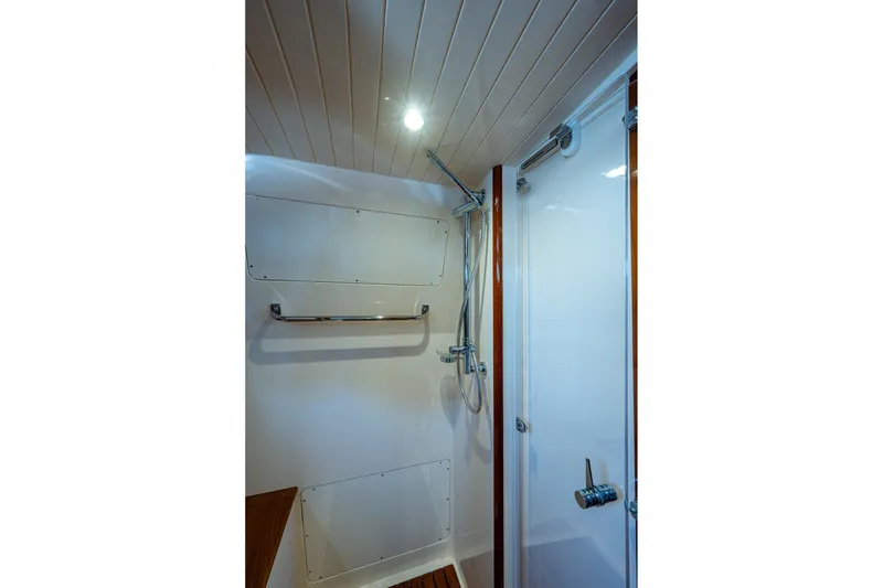 Slide: The Image of Shower area in 2020 Hinckley Picnic Boat 40, featuring sleek design and modern fixtures. - 27