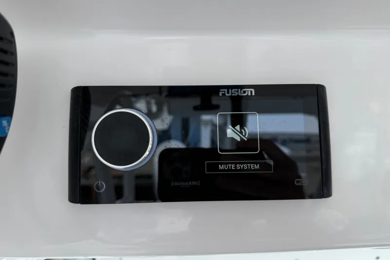 Slide: The Image of Fusion audio control panel on 2022 Everglades 365 Center Console boat. - 17