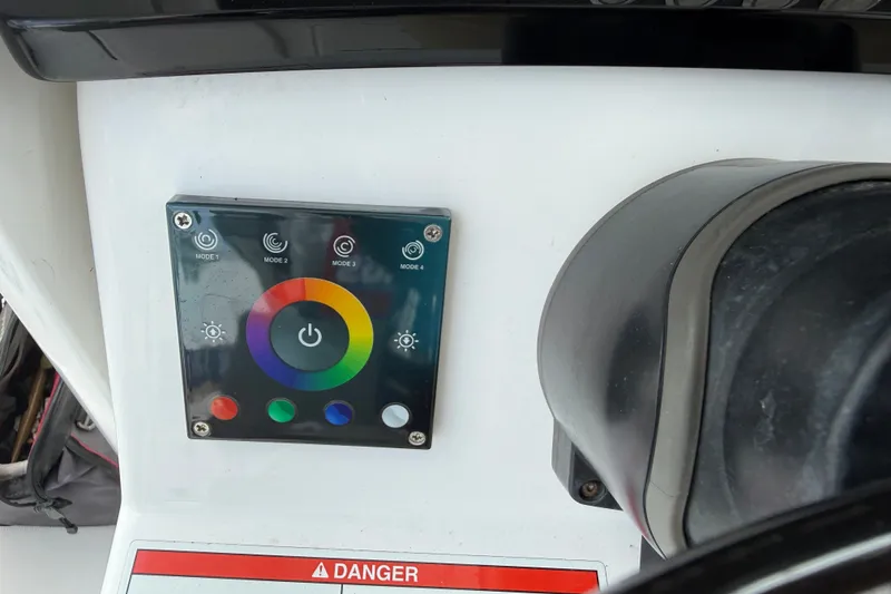Slide: The Image of Control panel on 2022 Everglades 365 Center Console boat with color and mode settings. - 15